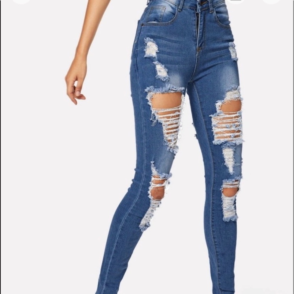 Ripped bleach wash skinny jeans